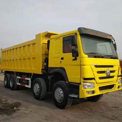 Sinotruk HOWO 8X4 371HP camion à ordures jaune d'occasion avec transmission manuelle