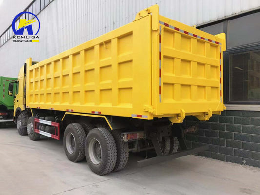 Le WD615.47.D12.42 8X4 12 pneus d'occasion HOWO Camion déchargeur Camion déchargeur avec élévation avant-moyenne