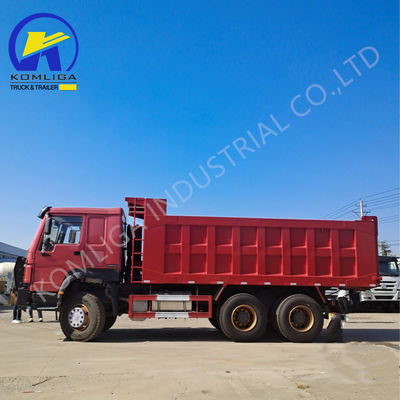 Camion à décharge Sinotruk HOWO d'occasion avec élévation hydraulique à bascule ventrale en bon état