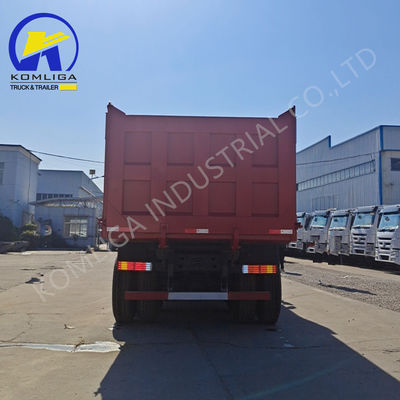 Camion à décharge Sinotruk HOWO d'occasion avec élévation hydraulique à bascule ventrale en bon état