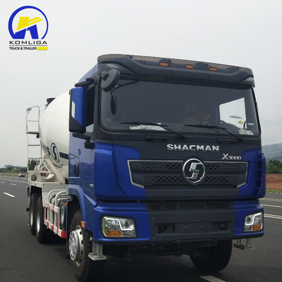 Shacman 6X4 camion mélangeur de béton avec haute performance et remontage hydraulique à bascule ventrale