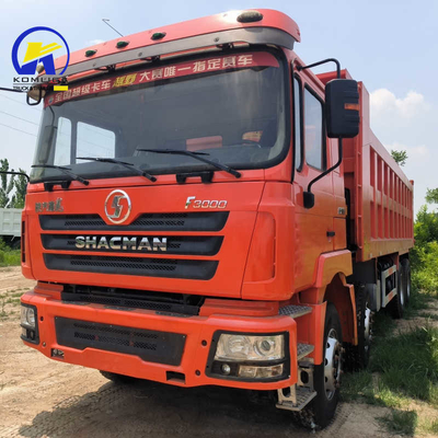 Téléchargement hydraulique à bascule ventrale Shacman F3000 8X4 camion poubelle usagé au Zimbabwe