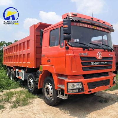 Téléchargement hydraulique à bascule ventrale Shacman F3000 8X4 camion poubelle usagé au Zimbabwe