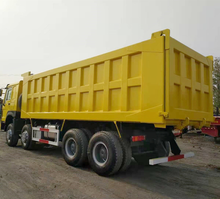 Sinotruk HOWO 8X4 371HP camion à ordures jaune d'occasion avec transmission manuelle