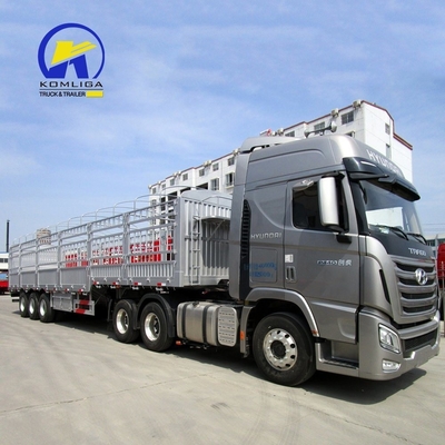 3 essieux remorque à clôture plate pour camions de marchandises pour charges lourdes et une capacité de chargement de 30 à 100 t